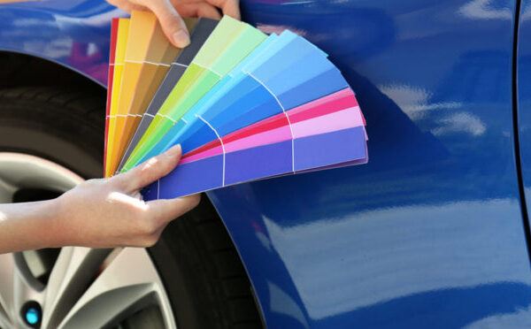 A car collision repair service being conducted at Network Auto Body.