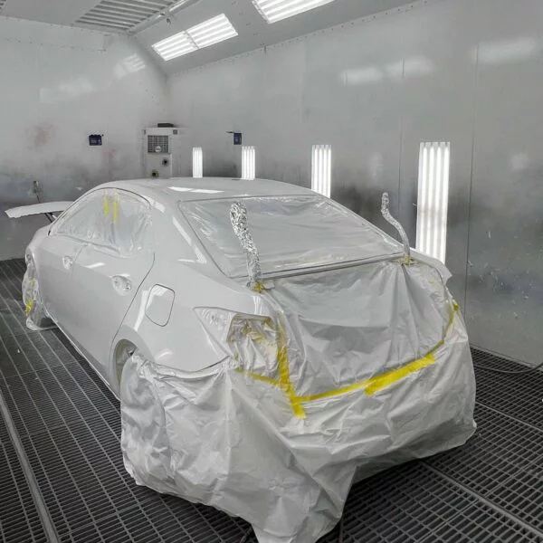 High-tech paint booth for premium auto painting services at Network Auto Body in Los Angeles.